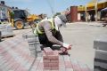 На улице Боевой в Астрахани ремонтируют тротуар: работы выполнены на 40%
